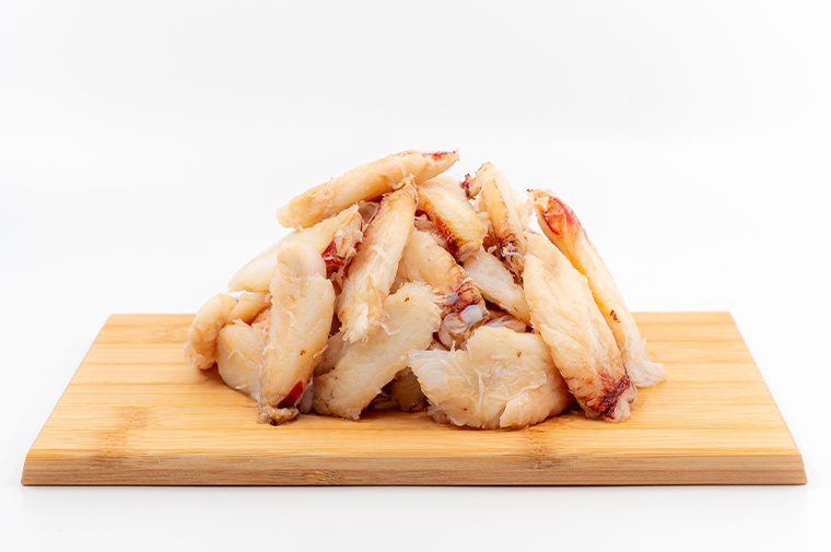 Pacific Dream Seafoods Dungeness crab fry legs cutting board