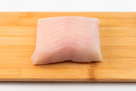 Pacific Dream Seafoods Halibut on cutting board