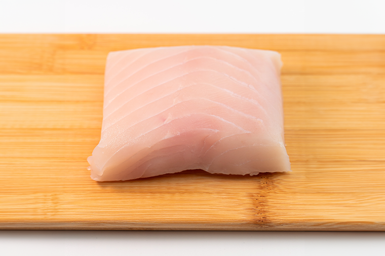 Pacific Dream Seafoods Halibut on cutting board