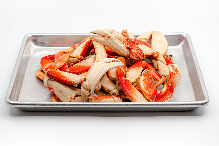 Pacific Dream Seafoods Dungeness crab legs on tray