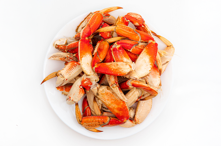Pacific Dream Seafoods Dungeness crab legs on plate