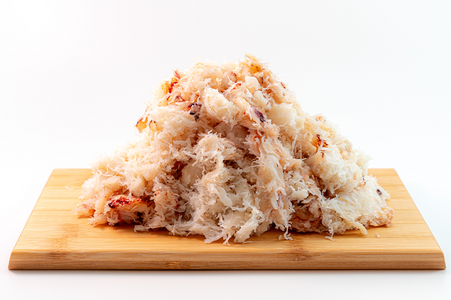 Pacific Dream Seafoods Dungeness crab meat on cutting board